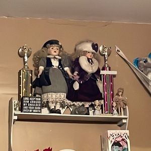 Selling just the two porcelain dolls about 20 years old in good condition